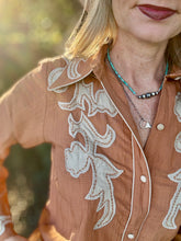 The Appaloosa apricot top