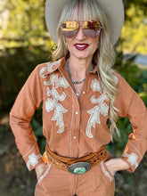 The Appaloosa apricot top