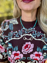 Run for the roses sweater
