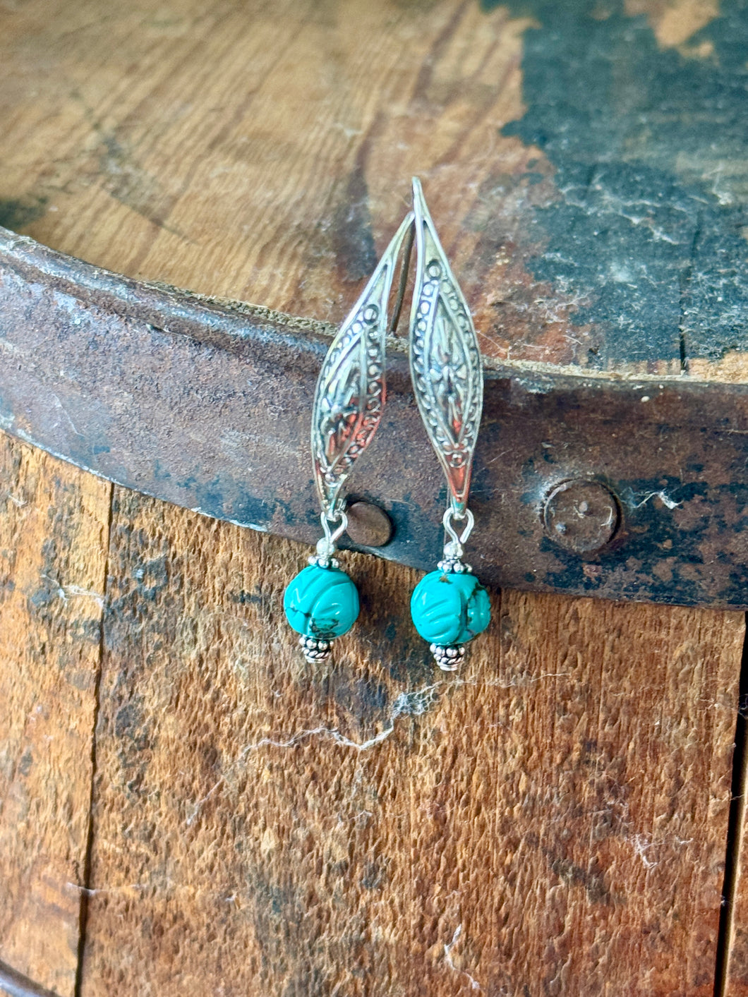 The ornate earrings