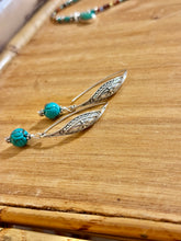 The ornate earrings