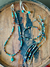 The ornate earrings