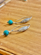The ornate earrings