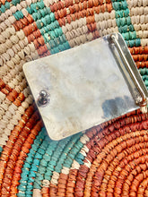 The pistol pearl buckle