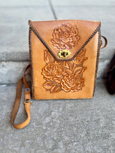 The High rise vintage tooled purse