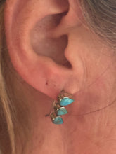 The Turquoise ear climber
