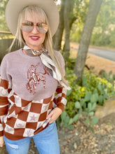 The wild checkmate sweater