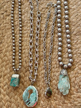 The Sticks and stones necklaces