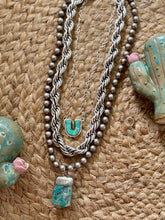 The Sticks and stones necklaces