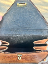 The High rise vintage tooled purse
