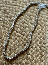 The silver spur necklace