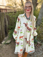 Woman wearing a dress with horse print outdoors