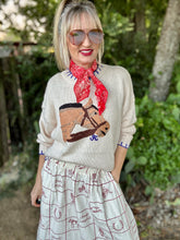 The Burberry bridle sweater