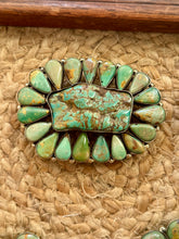 The Cluster buckle