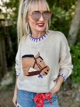 The Burberry bridle sweater