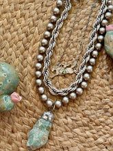 The Barclay Bucking necklaces