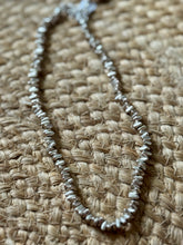 The silver spur necklace