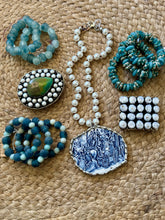 The Picture pearl buckle