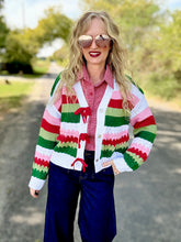 The Holiday ribbon sweater