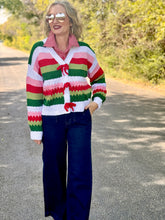 The Holiday ribbon sweater