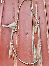 The lasso necklace
