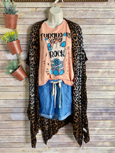 Turquoise rock tank