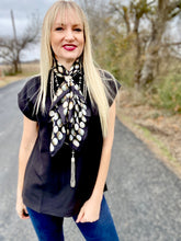 The benchmark blouse