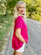 The poppy pink blouse